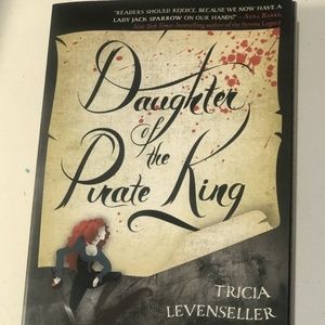 “Daughter Of The Pirate King” Written by Tricia Levenseller. Paperback Copy.
